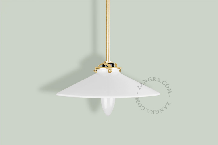 pendant light with opal glass shade and brass arm