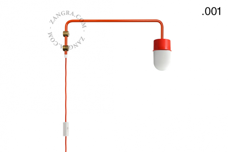 Red wall lamp with swing arm.