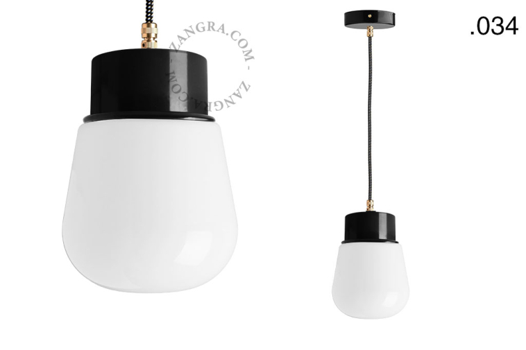 Black pendant light with glass shade.