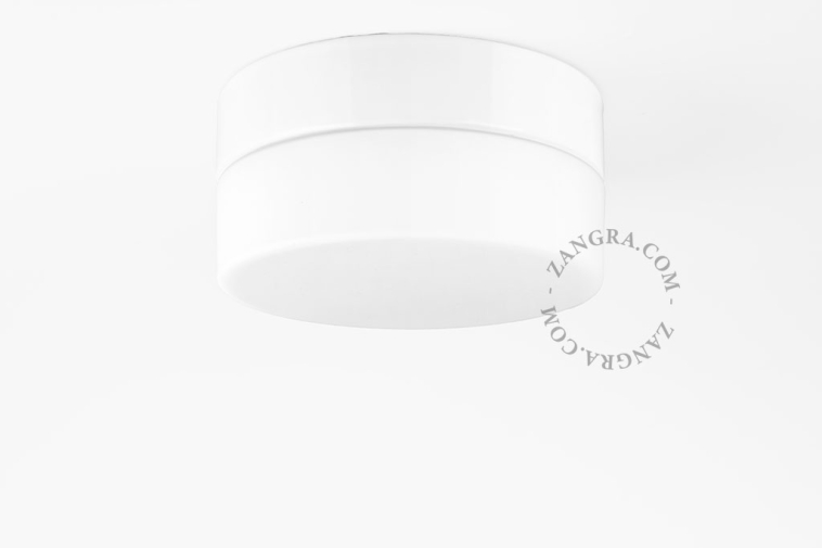 Candeeiro redondo em porcelana branco e vidro.