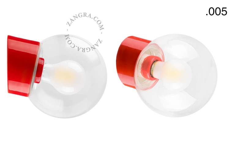Red porcelain wall light with glass lampshade.