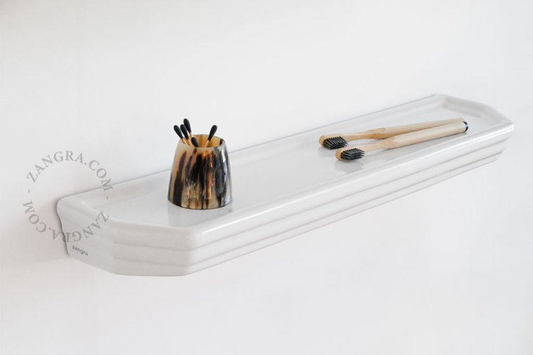 Washbasin shelf in white porcelain.