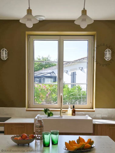 White bulkhead light for bathroom or outdoor use.