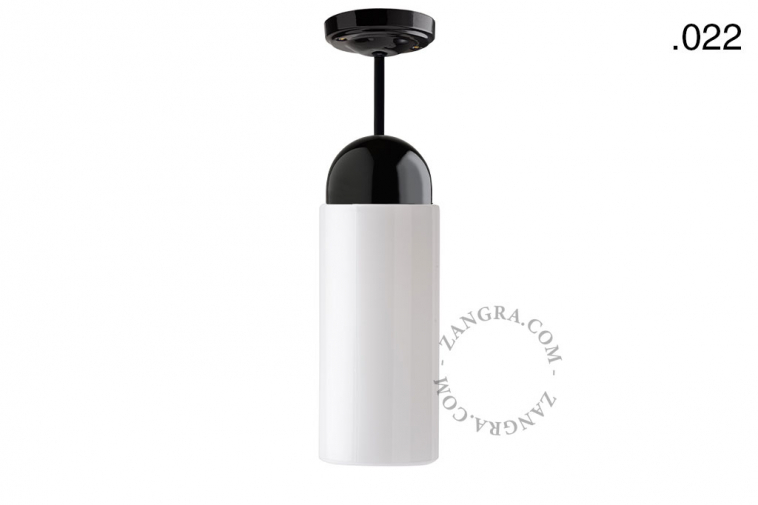 Black porcelain ceiling light with glass shade.