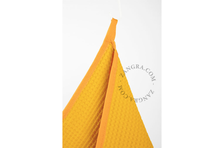 Retro okrągła ściereczka kuchenna o strukturze plastra miodu.