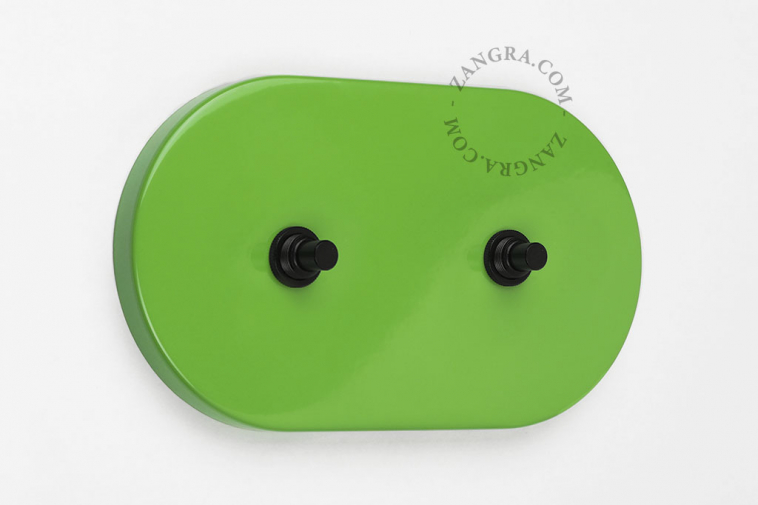 Oval green switch with 2 pushbuttons.