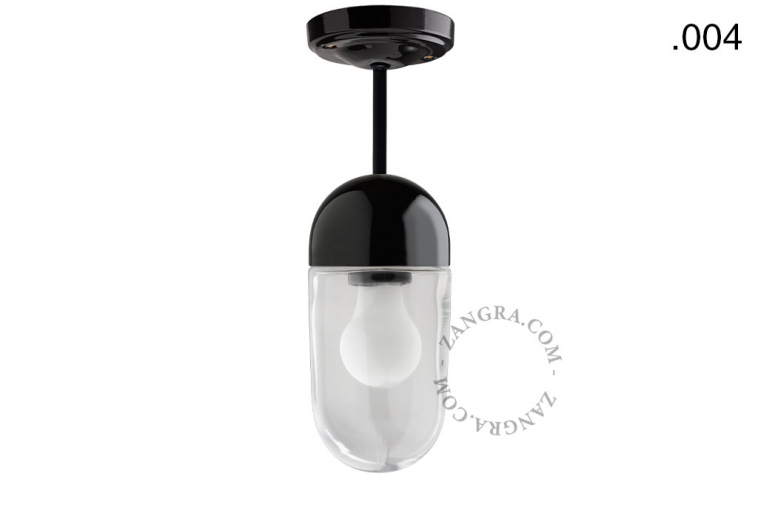 Black porcelain ceiling light with glass shade.