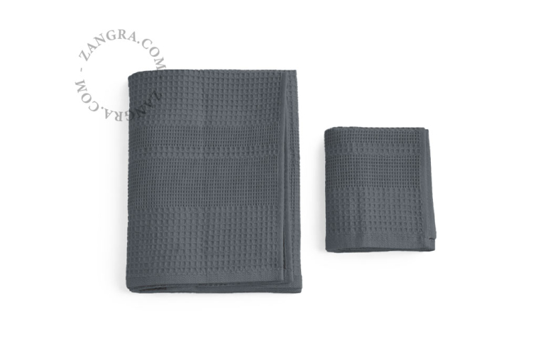 Dark grey honeycomb bath towel.