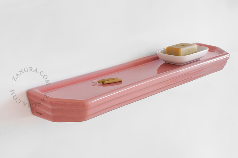 Washbasin shelf in pink porcelain.