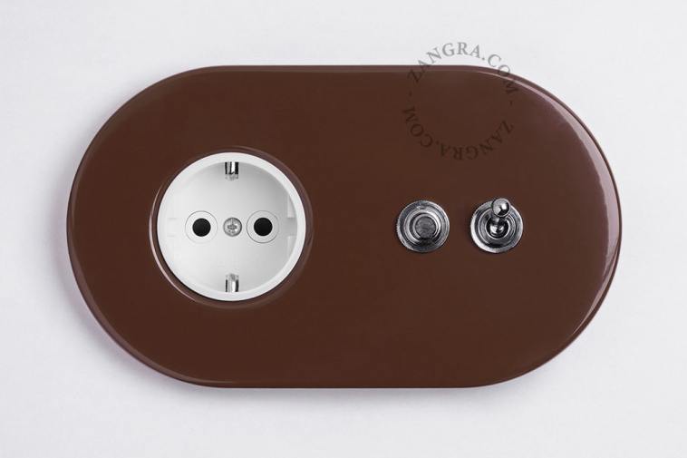 Brown outlet & switch + pushbutton.