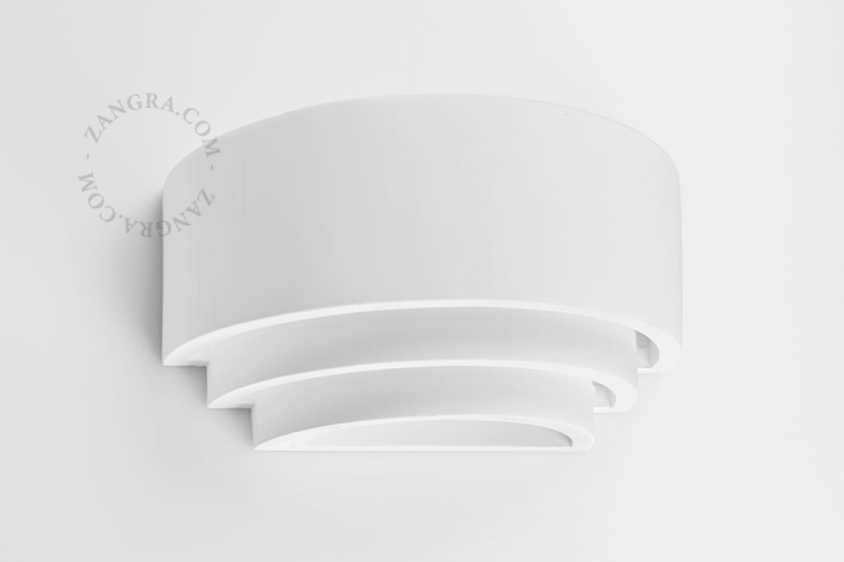 Paintable wall light in plaster.