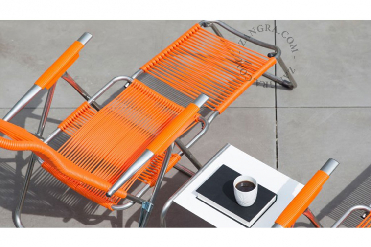 Chaise longue spaghetti orange.