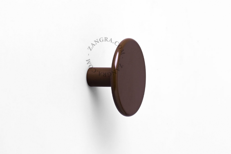 round brown wall hook or drawer knob