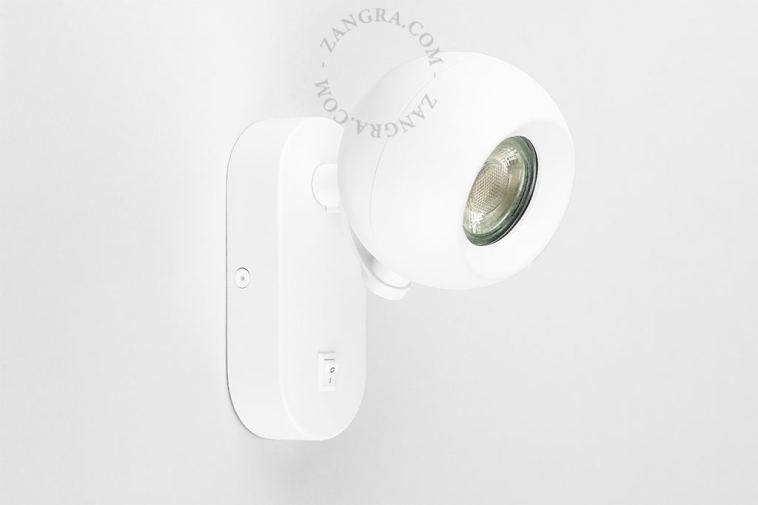 Bedside reading lamp with light switch.