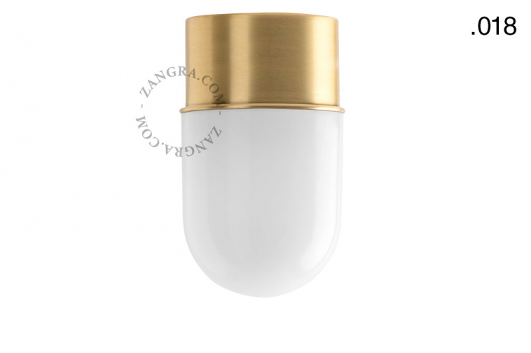 Brass ceiling light with glass shade.