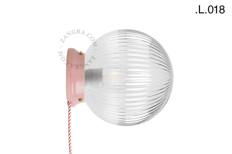 Pink Art Deco light with glass shade.
