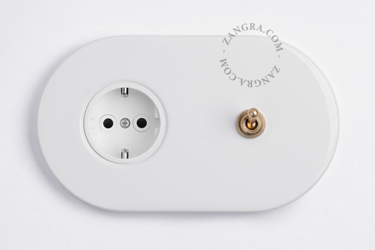 white flush mount outlet & two-way or simple switch – raw brass toggle