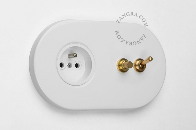 white flush mount outlet & two-way or simple switch – raw brass toggle & pushbutton