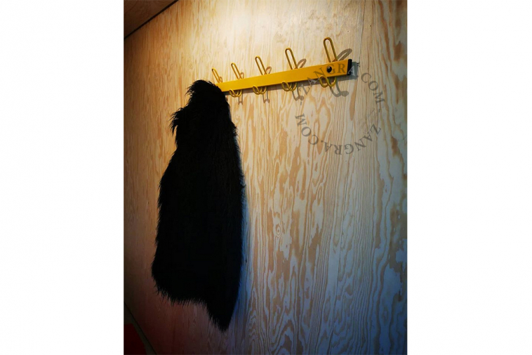 yellow coat rack
