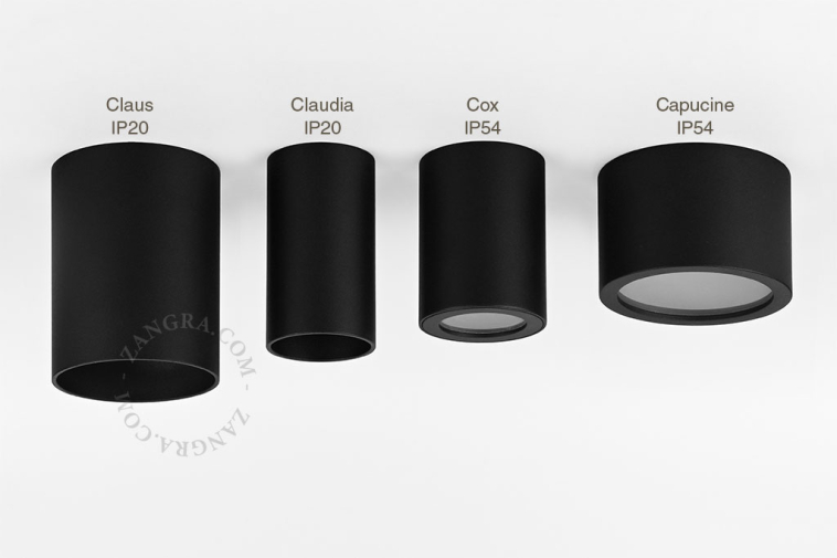 Surface-mounted cylindrical spotlight.