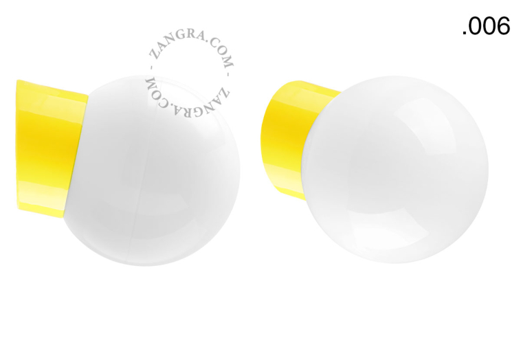 Yellow porcelain wall light with glass lampshade.