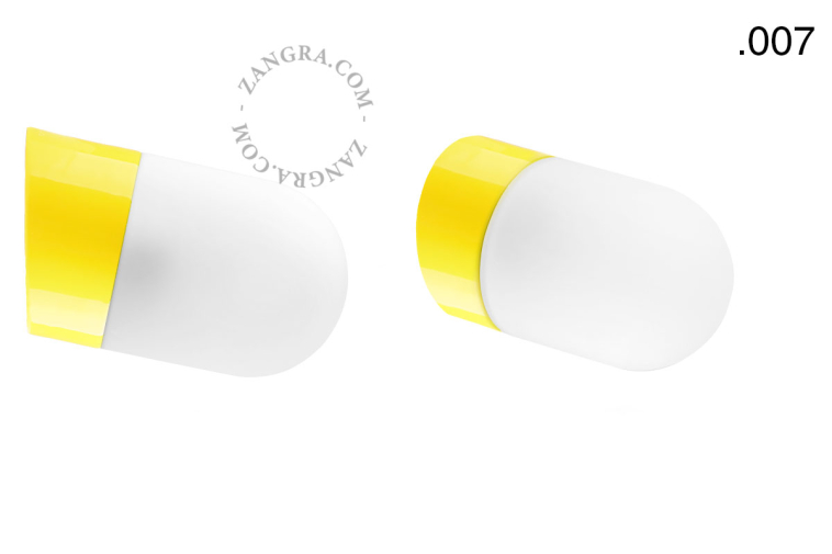 Yellow porcelain wall light with glass lampshade.