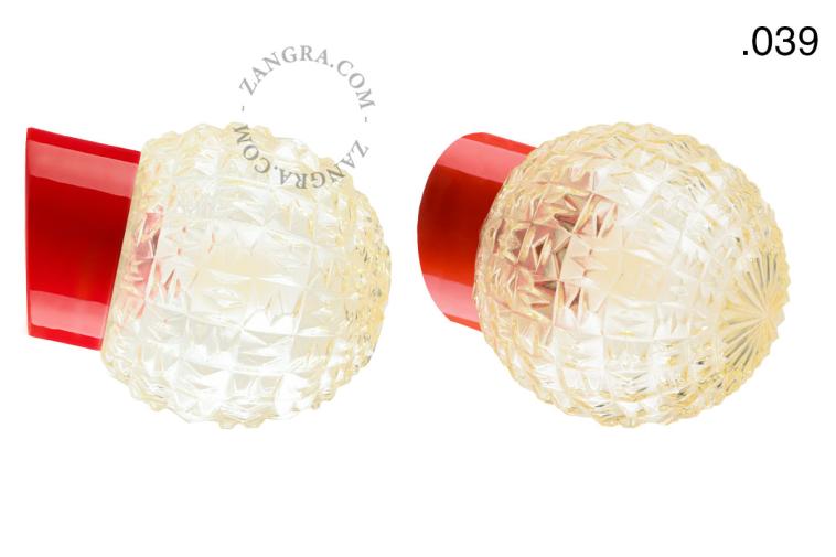 Red porcelain wall light with glass lampshade.