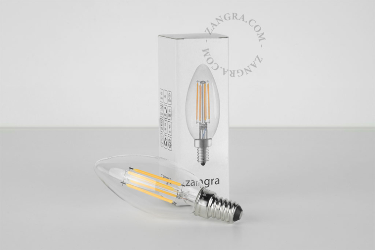 Candelabra E14 filament LED light bulb with clear glass.