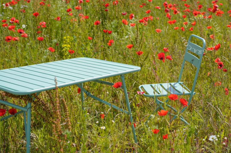 Metal outdoor folding chairs.