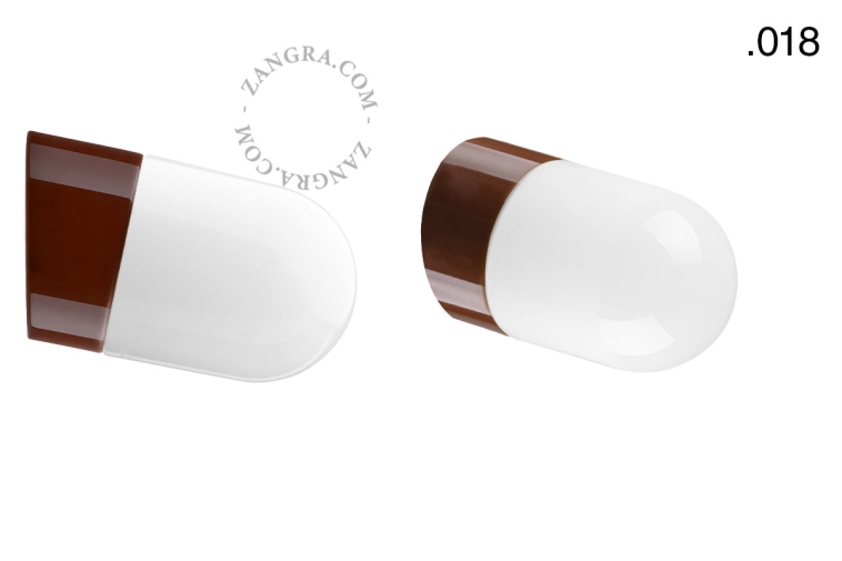 Brown porcelain wall light with glass lampshade.