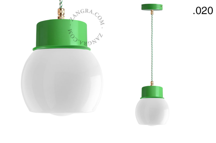 Green pendant light with glass shade.