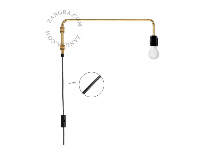 black porcelain and brass wall light with swing arm and plug