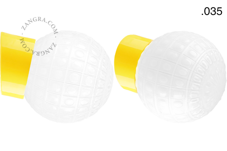 Yellow porcelain wall light with glass lampshade.