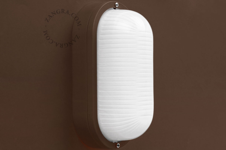 Brązowa lampa typu bulkhead.