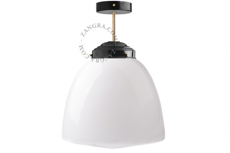 Black and brass retro pendant light schoolhouse style with glass shade.