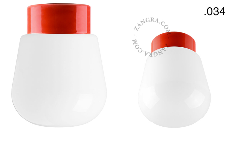 Porseleinen lamp in de kleur rood.