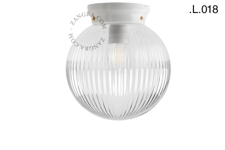 Art Deco Leuchte aus Porzellan mit Glasschirm.