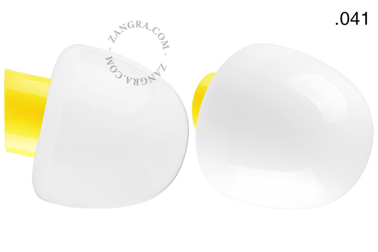 Yellow porcelain wall light with glass lampshade.