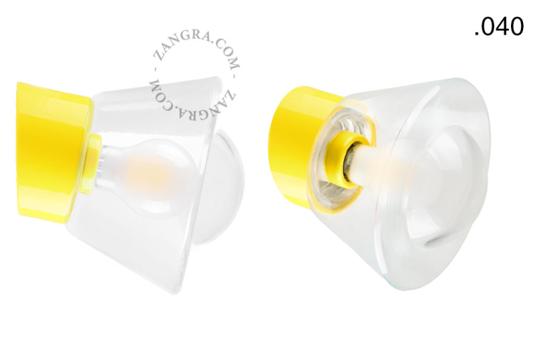 Yellow porcelain wall light with glass lampshade.