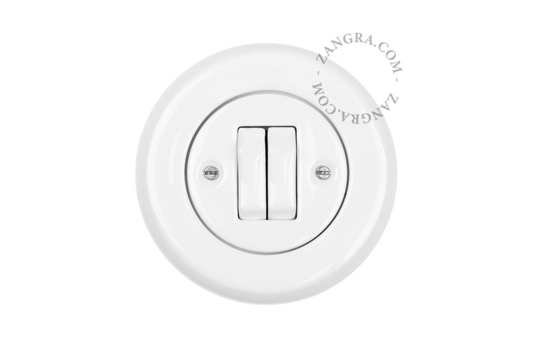 Schalter aus weissem Porzellan.