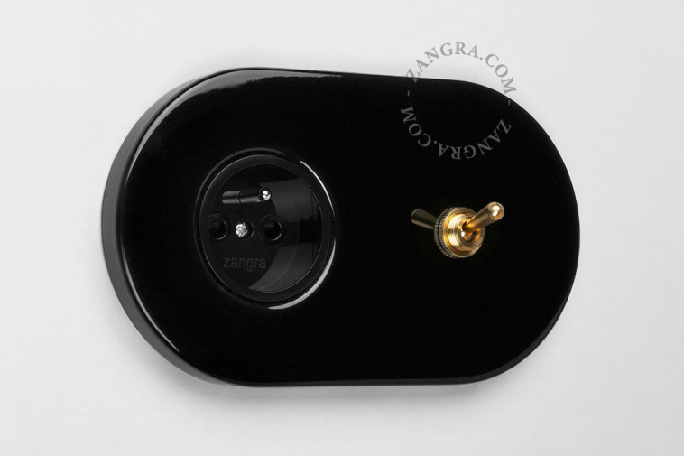black flush mount outlet & two-way or simple switch – raw brass toggle