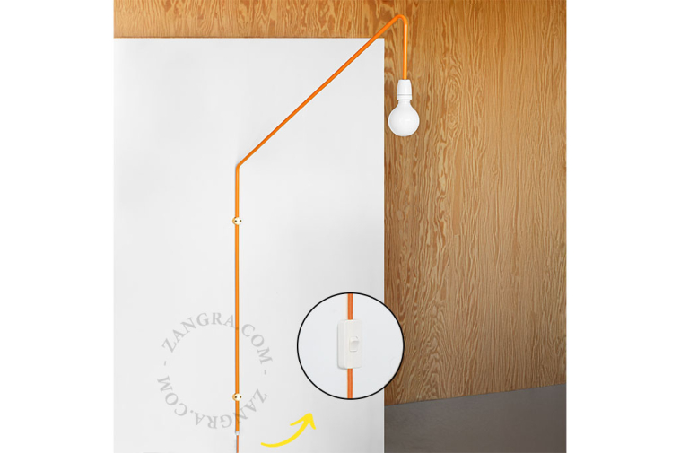 Wall light with swivelling arm.