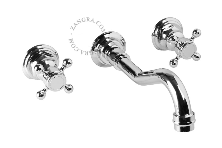 Concealed washbasin tap with two cross handles.