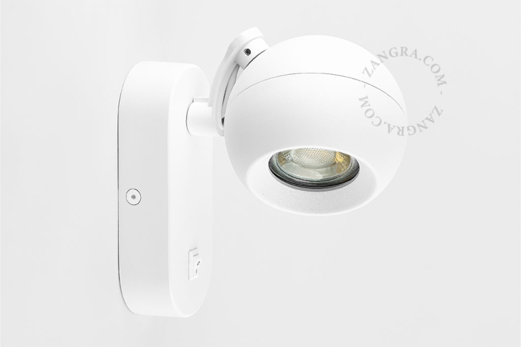 Bedside reading lamp with light switch.