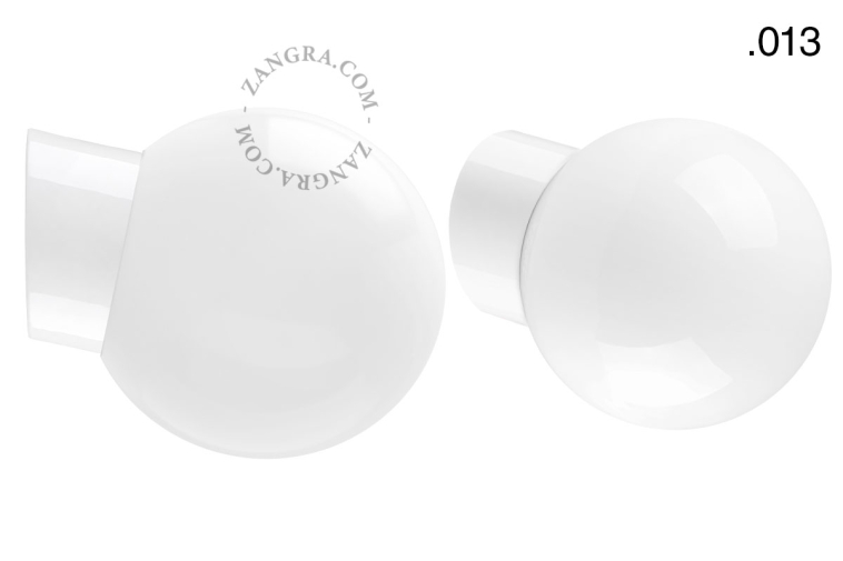 White porcelain wall light with glass lampshade.