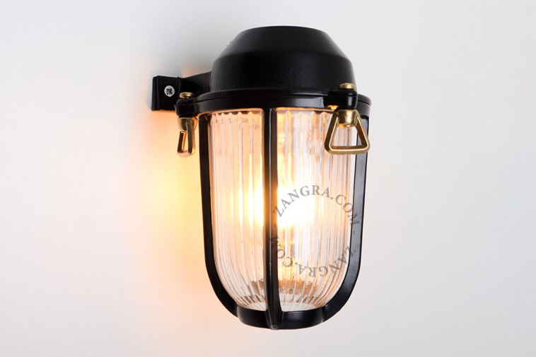 Black ship light for bathroom or outdoor use.