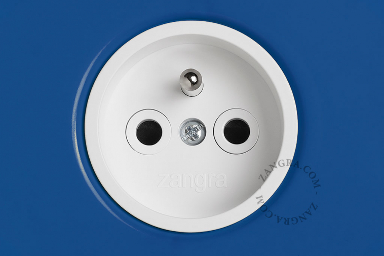blue flush mount outlet & switch – raw brass pushbutton