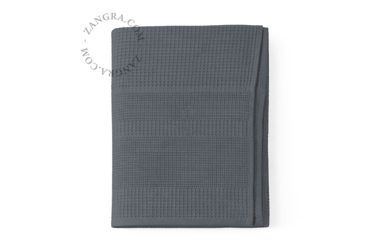 Dark grey honeycomb bath towel.