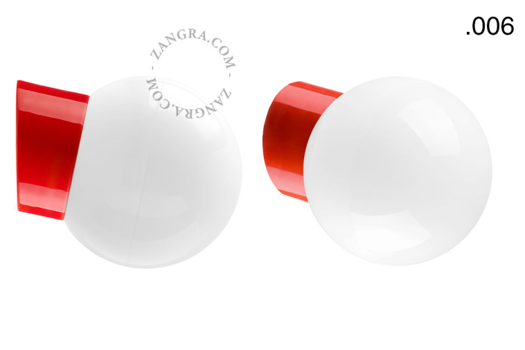 Red porcelain wall light with glass lampshade.