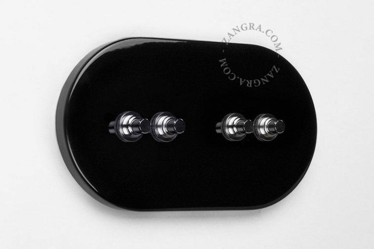 Black switch with 4 nickel-plated pushbuttons.